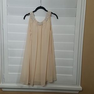 A cream-colored elegant dress